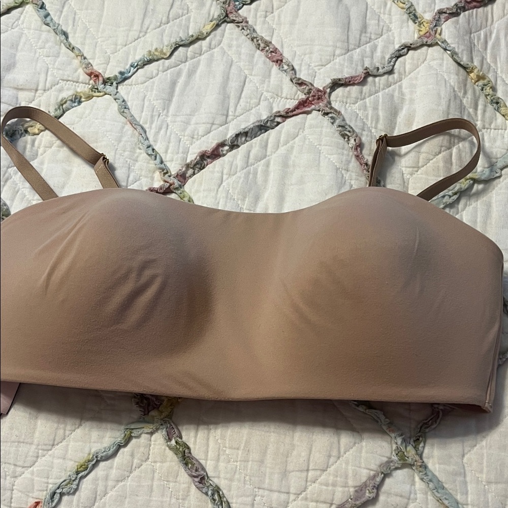 Strapless VS tan bra with removeable straps.